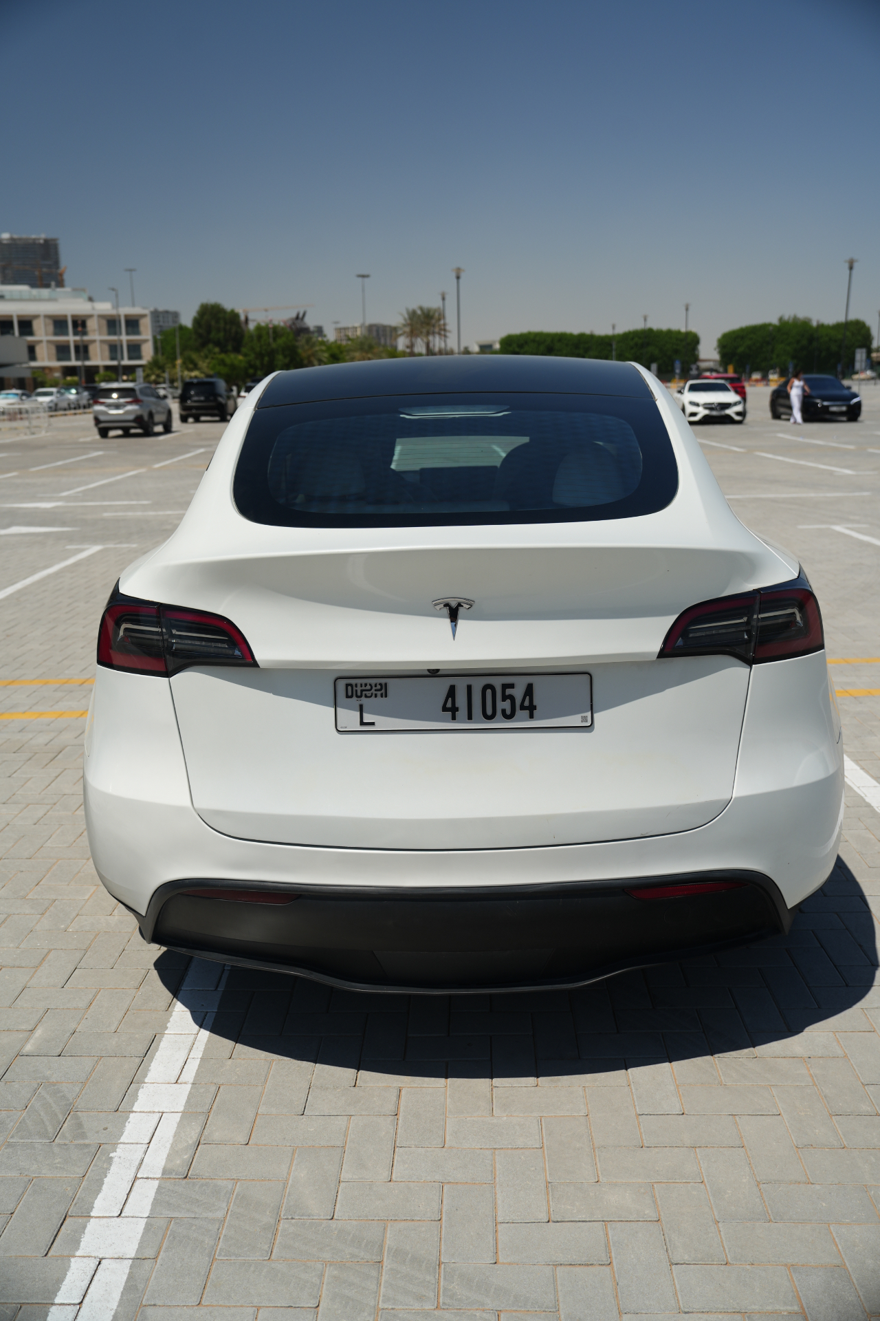 Tesla Model Y — rear view on Dubai street