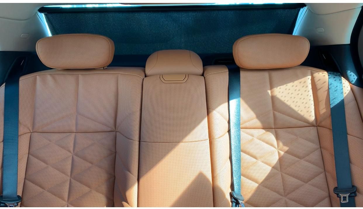 BMW 7 Series — diamond-stitched cognac rear seats