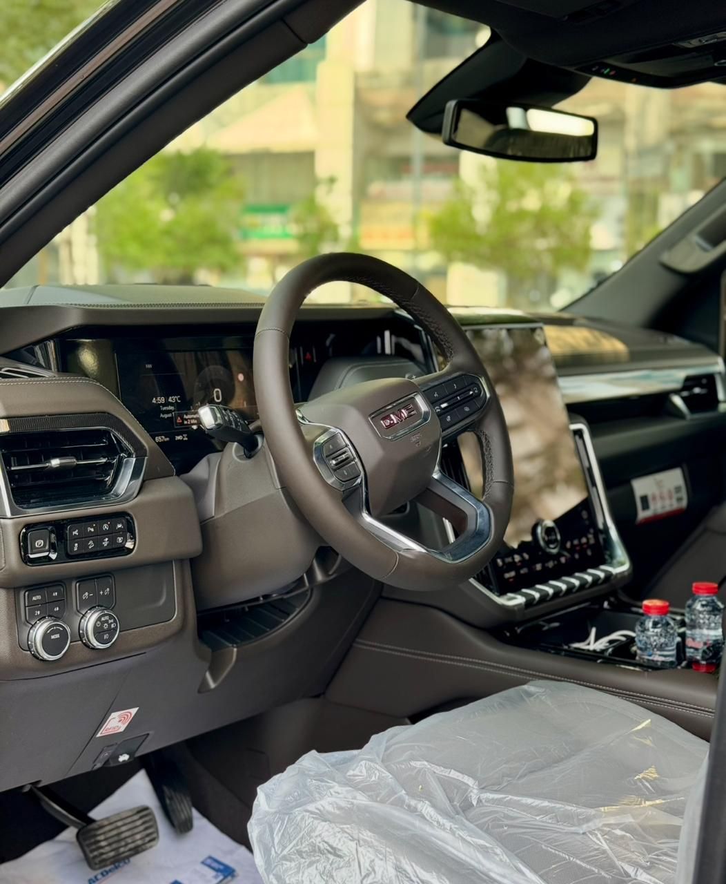 GMC Yukon XL — driver cockpit and steering