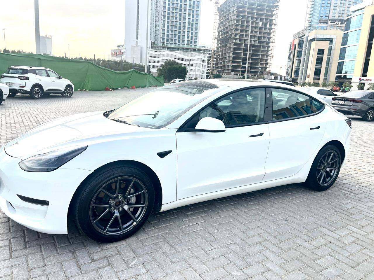 Tesla Model 3 — side profile