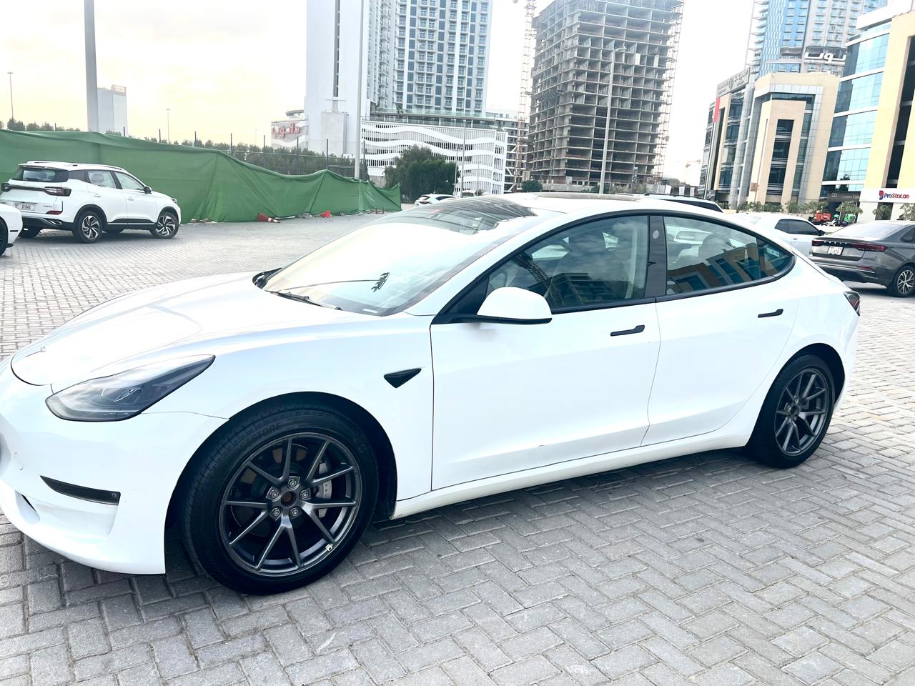 Tesla Model 3 — side profile